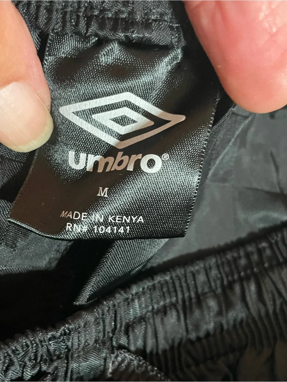 Umbro Kids Black Athletic Shorts with Gray T-Shirt and socks